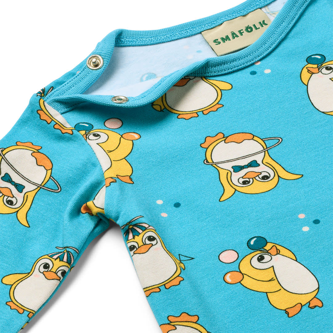 Elstar langærmet heldragt med cirkus pingviner