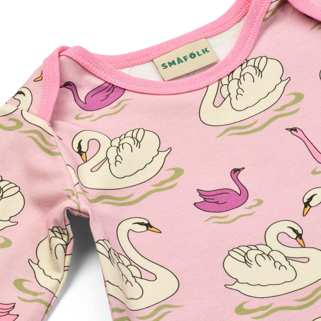 Ulm langærmet heldragt med svaner