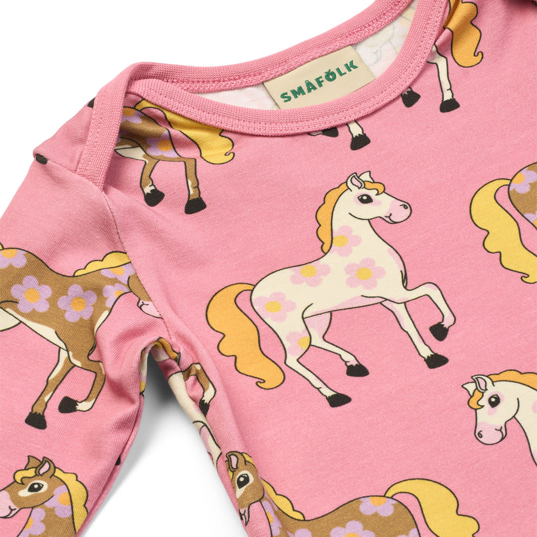 Ulm langærmet heldragt med heste